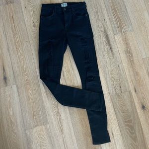 Agolde distressed high rise jeans.